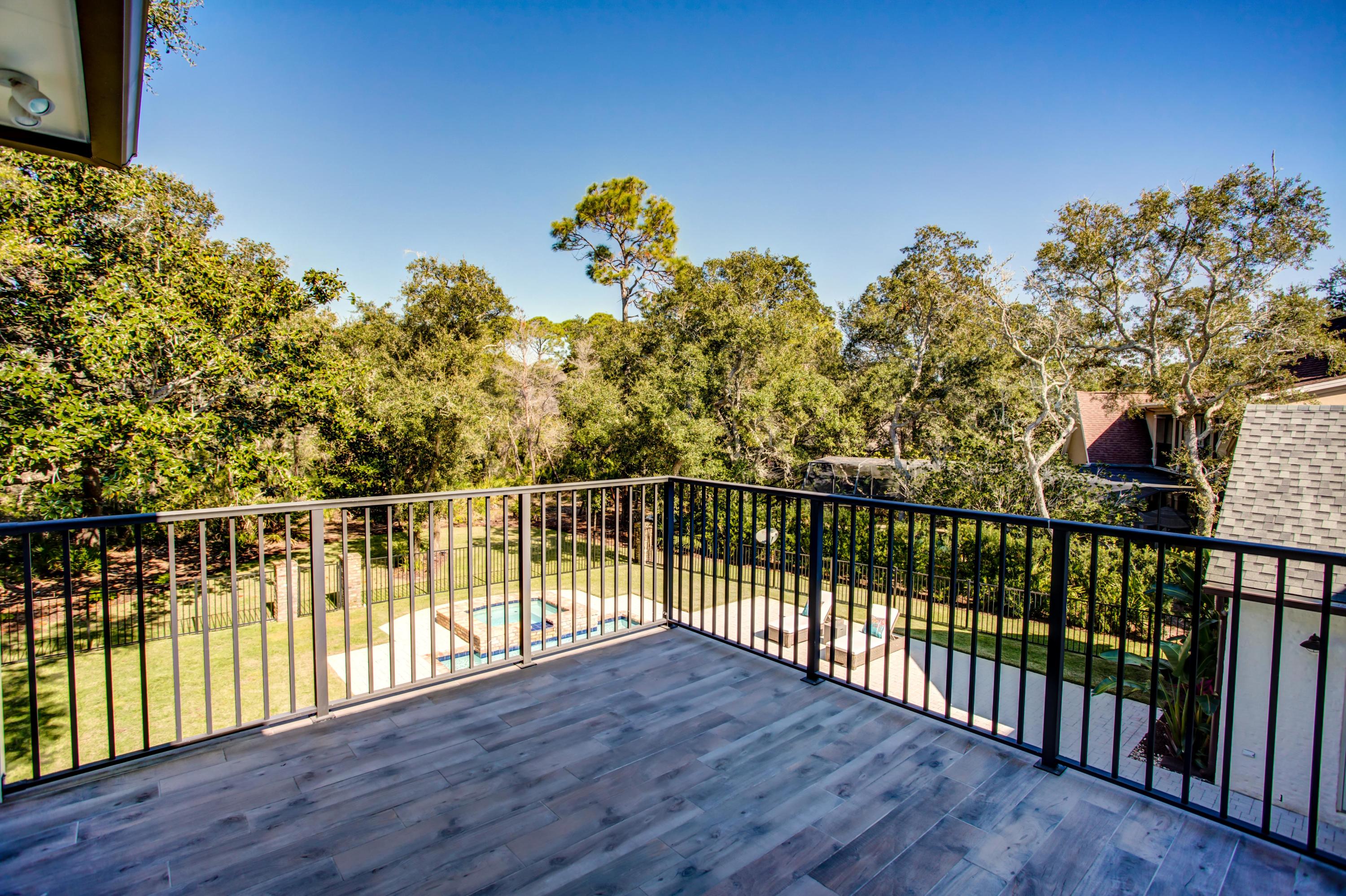 239 Mattie's Way Destin, FL 32541 - Photo 34 of 53 a view of a balcony with wooden floor