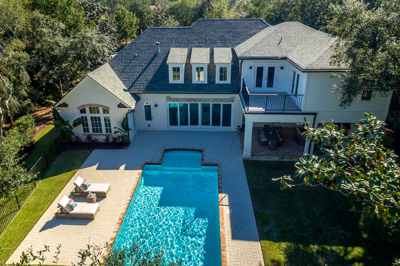 239 Mattie's Way Destin, FL 32541 - Photo 39 of 53 a front view of a house with garden