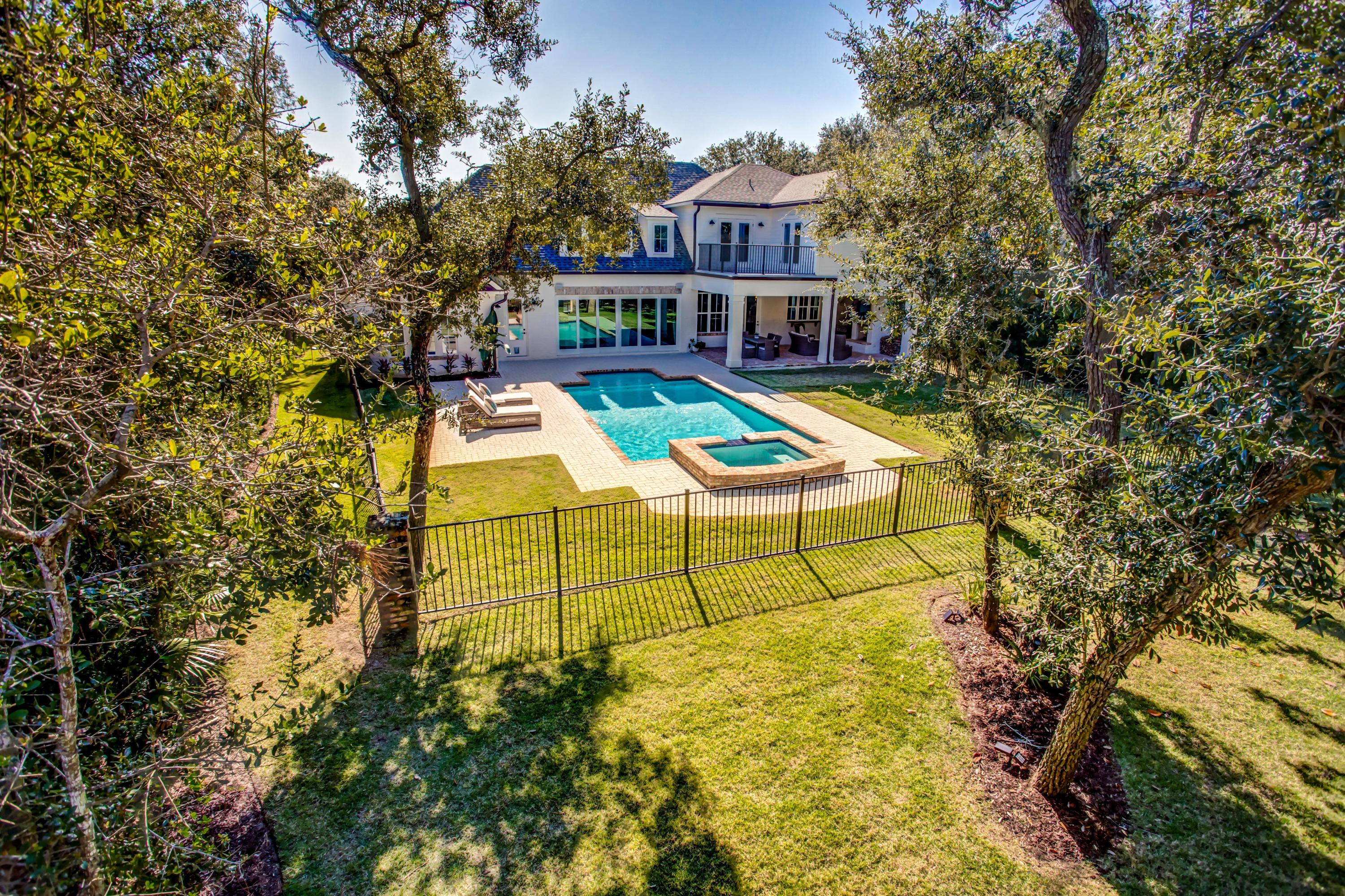 239 Mattie's Way Destin, FL 32541 - Photo 42 of 53 a view of a house with a swimming pool
