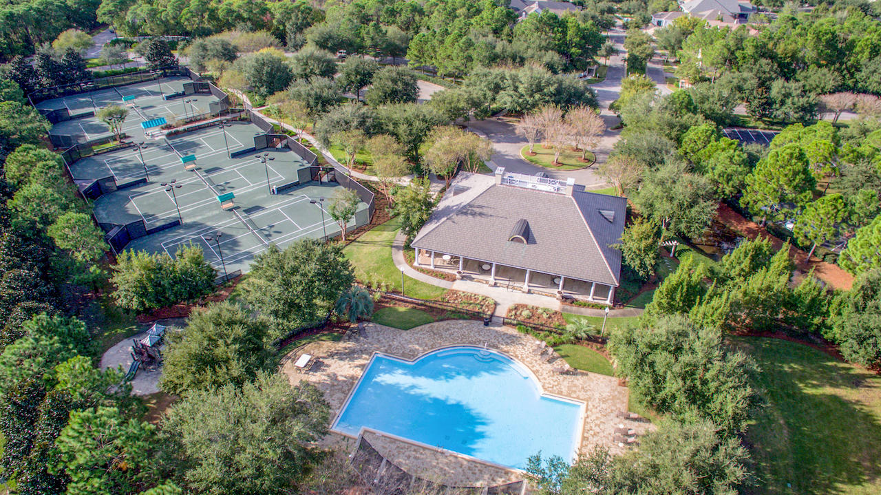 239 Mattie's Way Destin, FL 32541 - Photo 52 of 53 an aerial view of a house with a yard