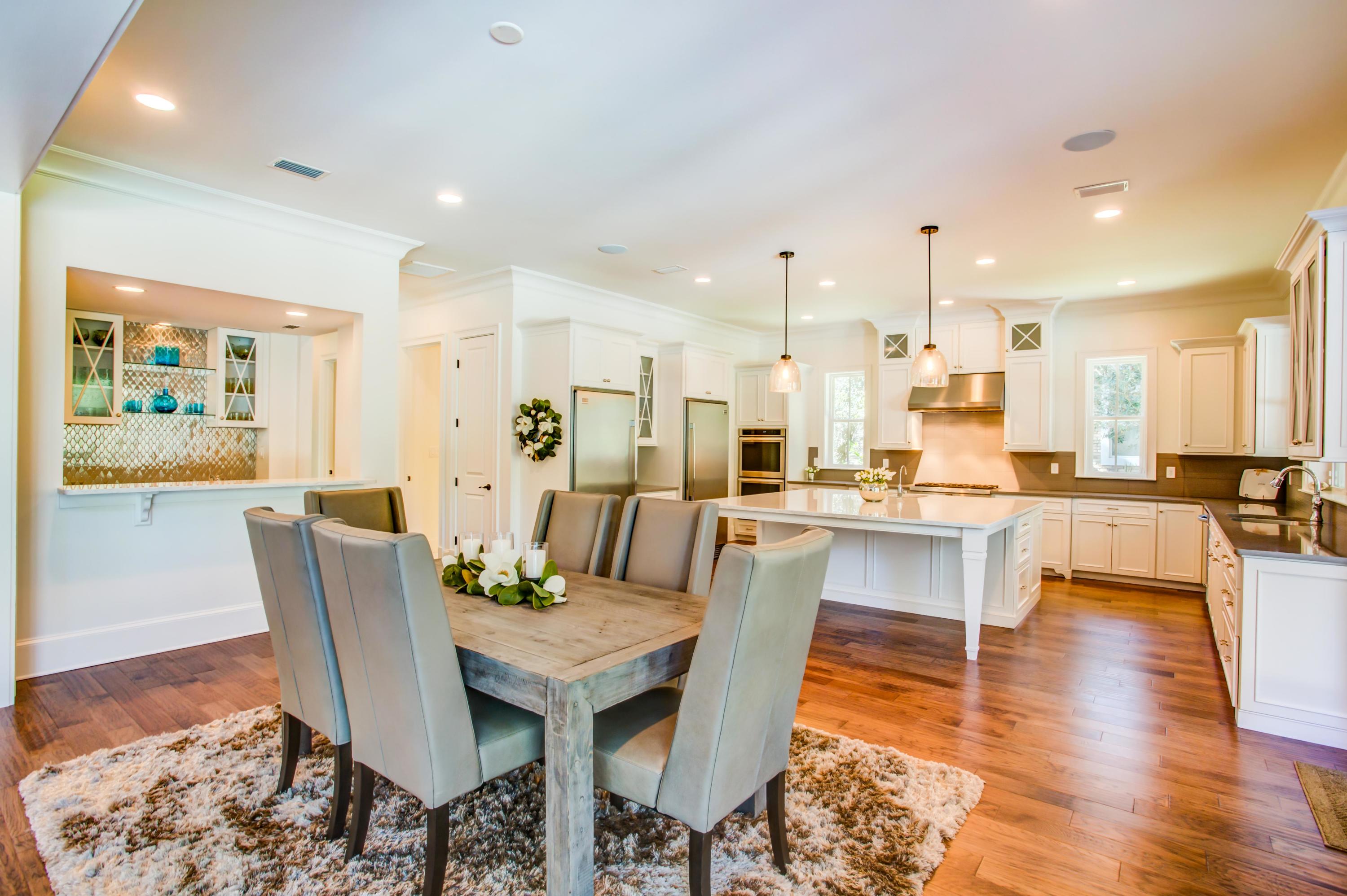 239 Mattie's Way Destin, FL 32541 - Photo 9 of 53 a view of a dining room with furniture