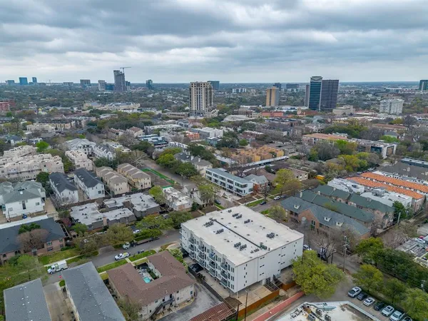 an aerial view of a city with lots of residential buildings