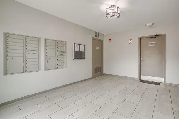 a view of hallway with closet