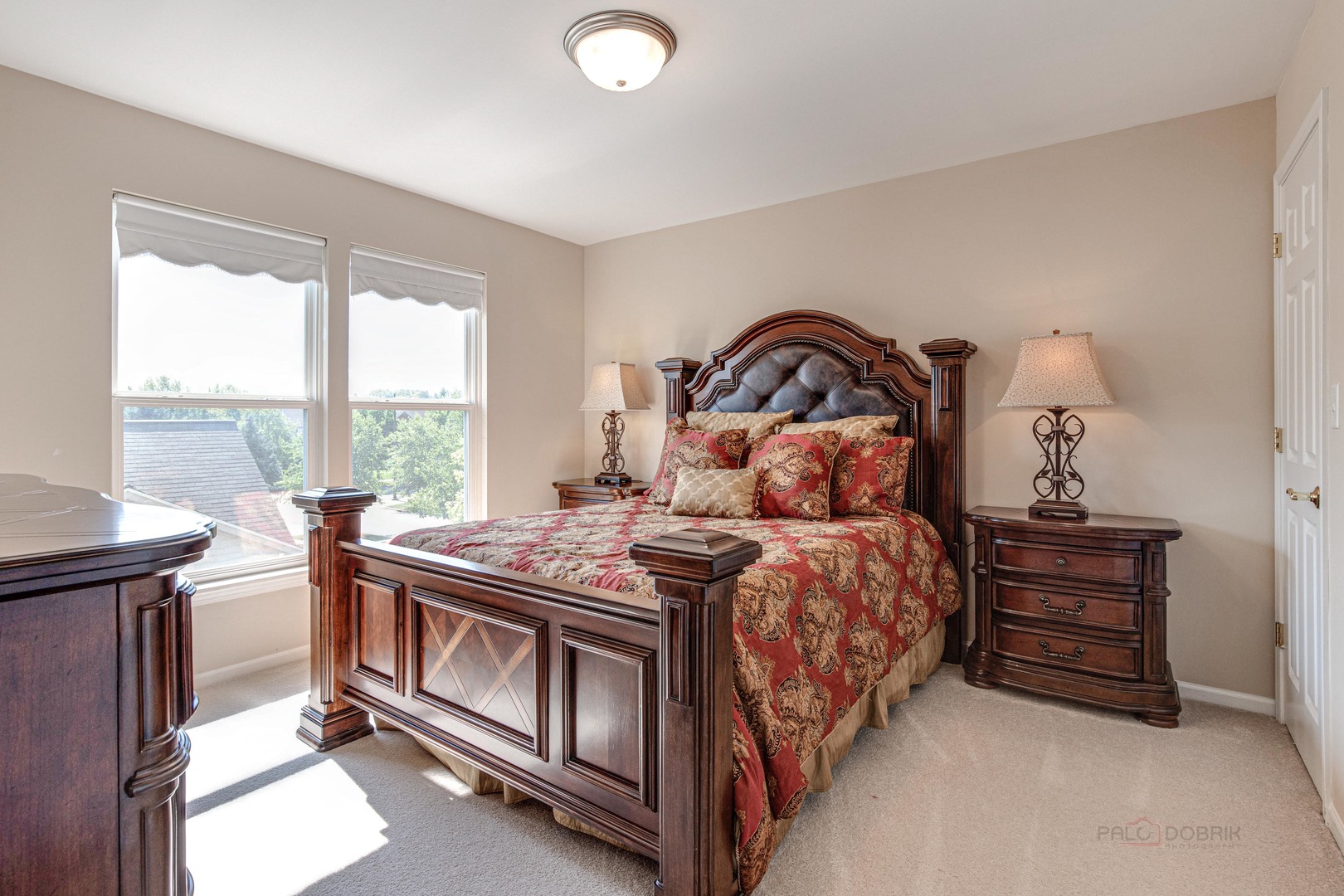 409 Wildflower Way Streamwood, IL 60107 - Photo 28 of 53 a bedroom with a bed and a large window