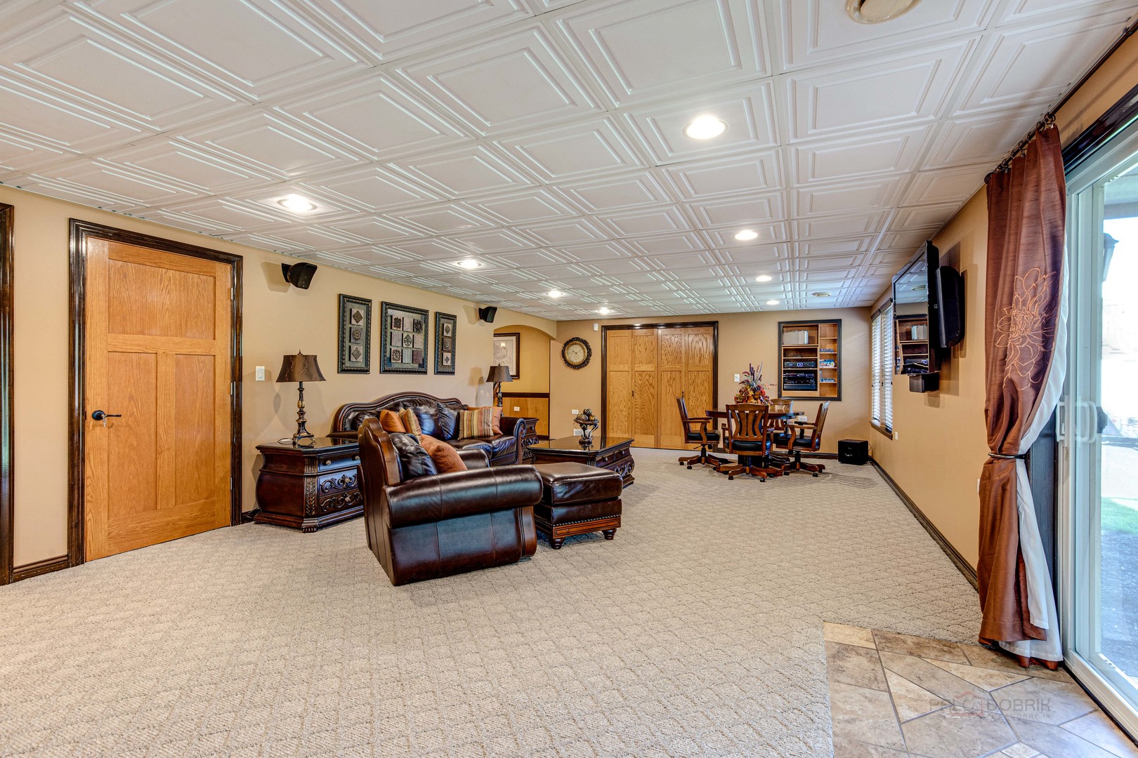 409 Wildflower Way Streamwood, IL 60107 - Photo 34 of 53 a bed room with furniture and a flat screen tv