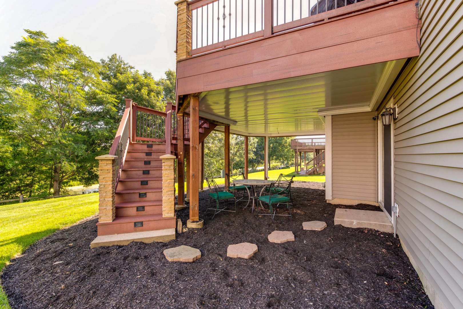 409 Wildflower Way Streamwood, IL 60107 - Photo 41 of 53 a view of a back yard with sitting area