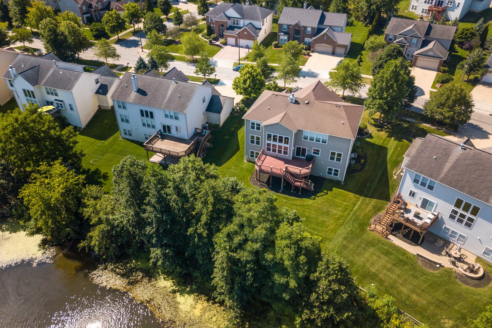 409 Wildflower Way Streamwood, IL 60107 - Photo 46 of 53 an aerial view of residential houses with outdoor space and street view