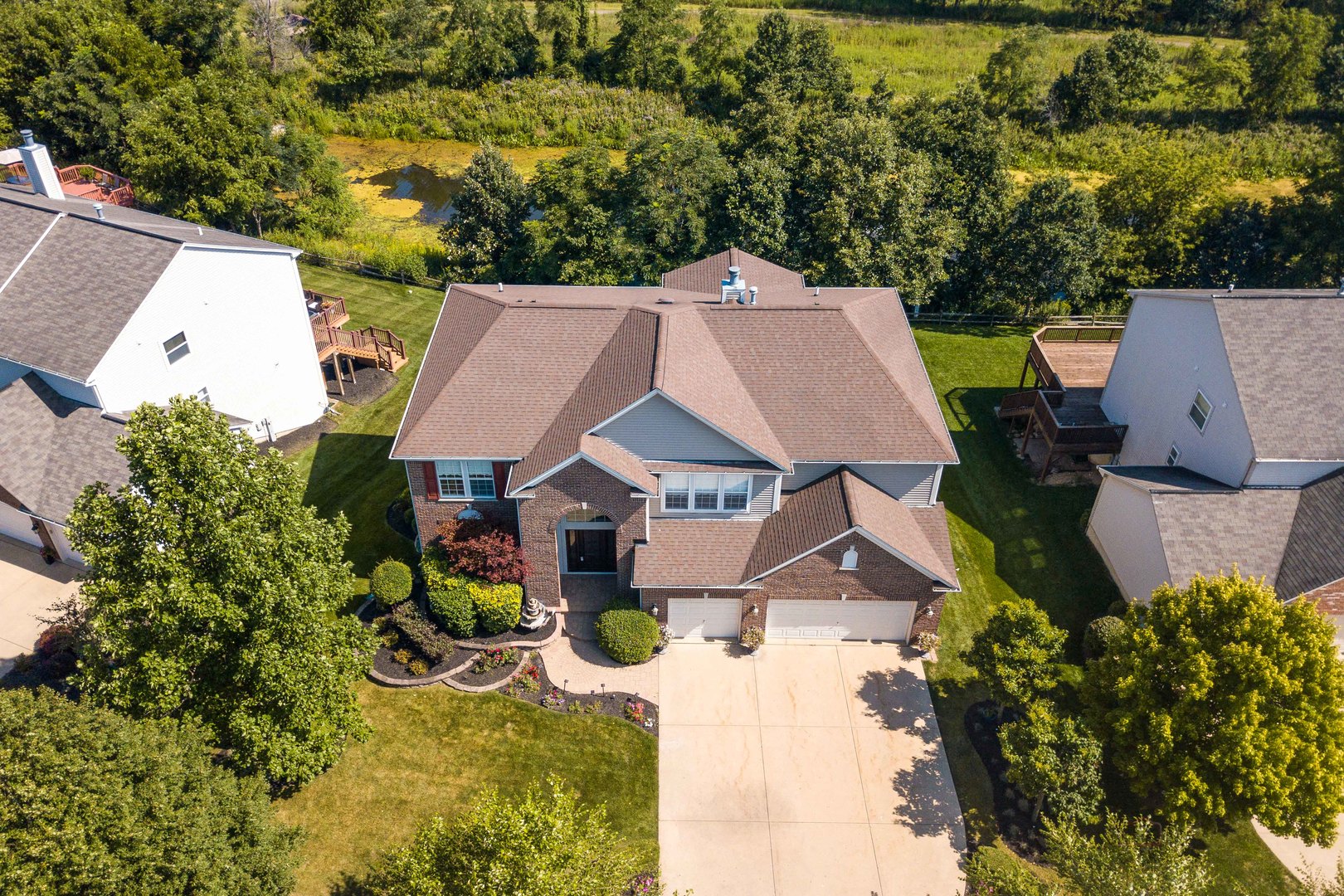 409 Wildflower Way Streamwood, IL 60107 - Photo 48 of 53 an aerial view of a house with a yard