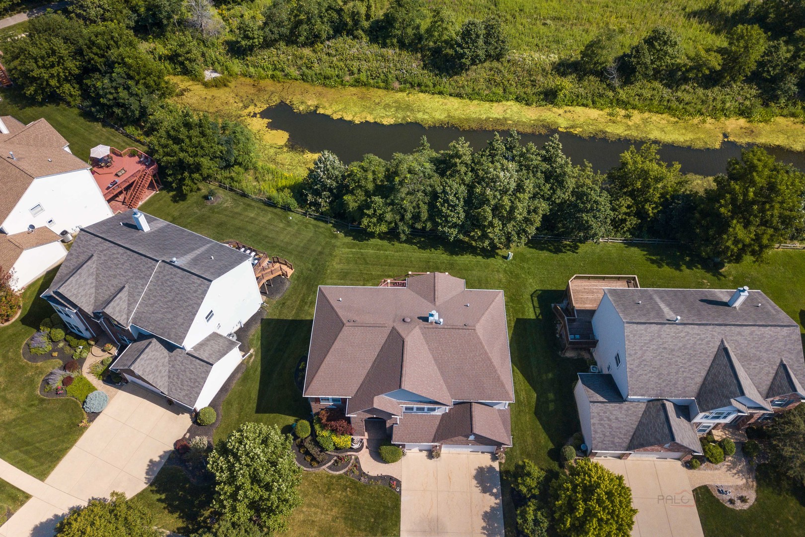 409 Wildflower Way Streamwood, IL 60107 - Photo 50 of 53 an aerial view of a house with a lake view