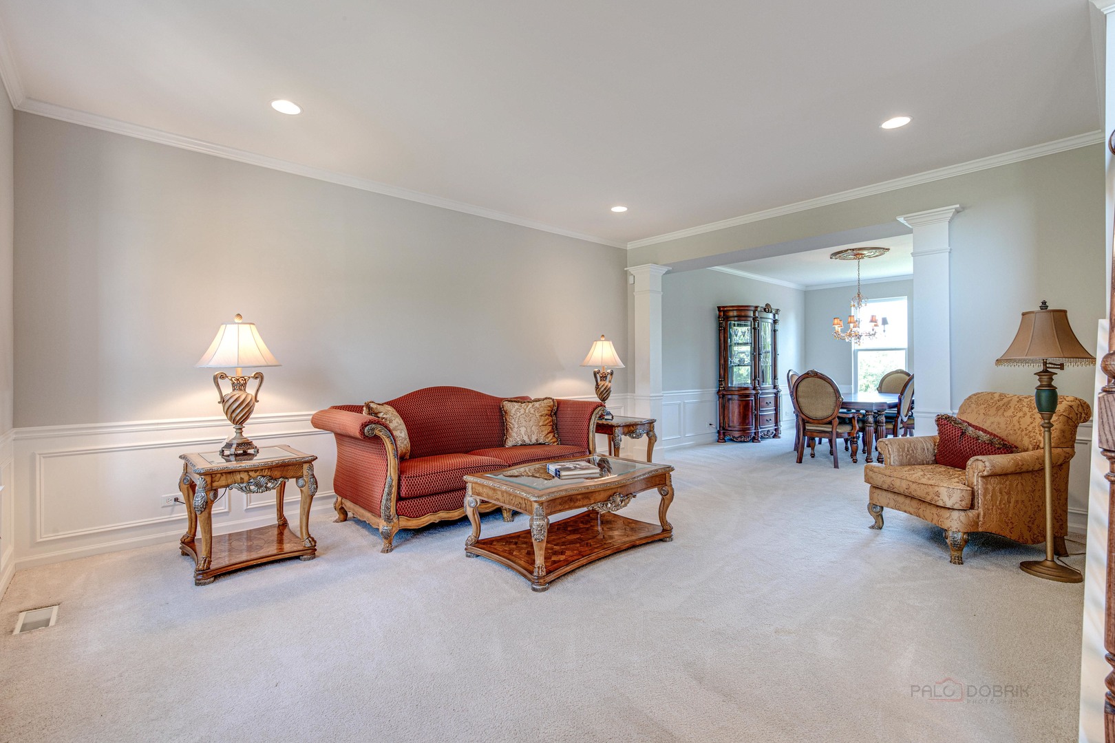 409 Wildflower Way Streamwood, IL 60107 - Photo 6 of 53 a living room with furniture and a lamp