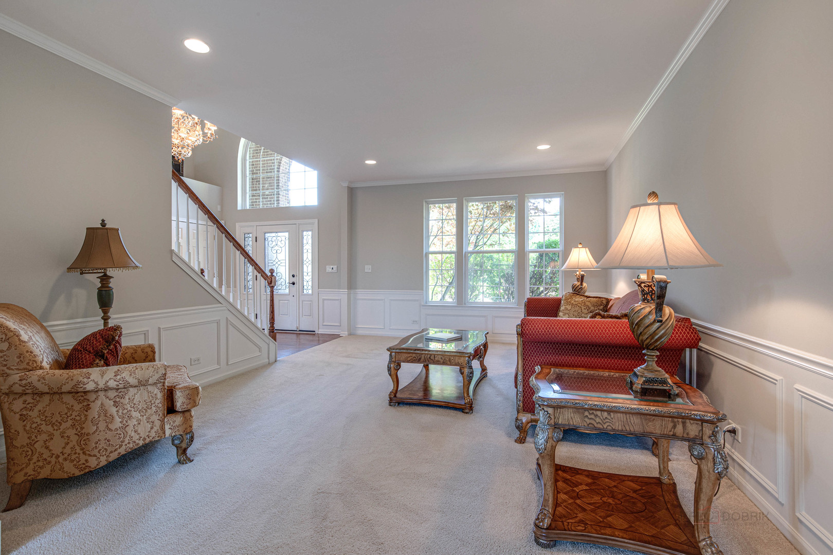 409 Wildflower Way Streamwood, IL 60107 - Photo 7 of 53 a living room with furniture and a window
