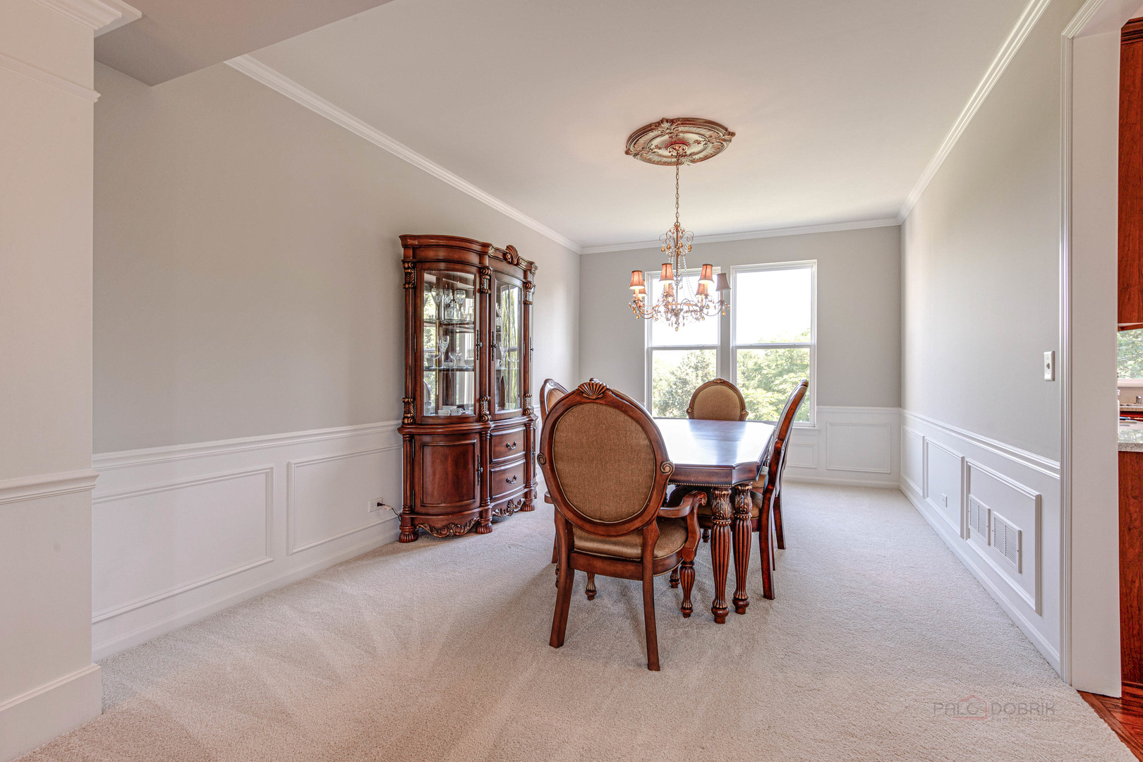 409 Wildflower Way Streamwood, IL 60107 - Photo 8 of 53 a view of a dining room with furniture window and wooden floor