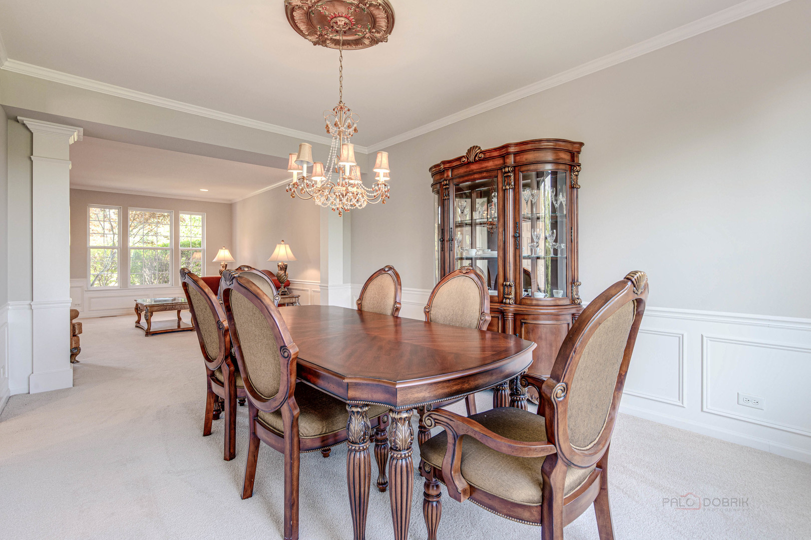 409 Wildflower Way Streamwood, IL 60107 - Photo 9 of 53 a view of a dining room with furniture and chandelier