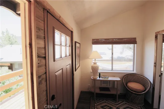 a bathroom with a sink a toilet and a window