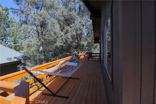 a view of a balcony with chairs