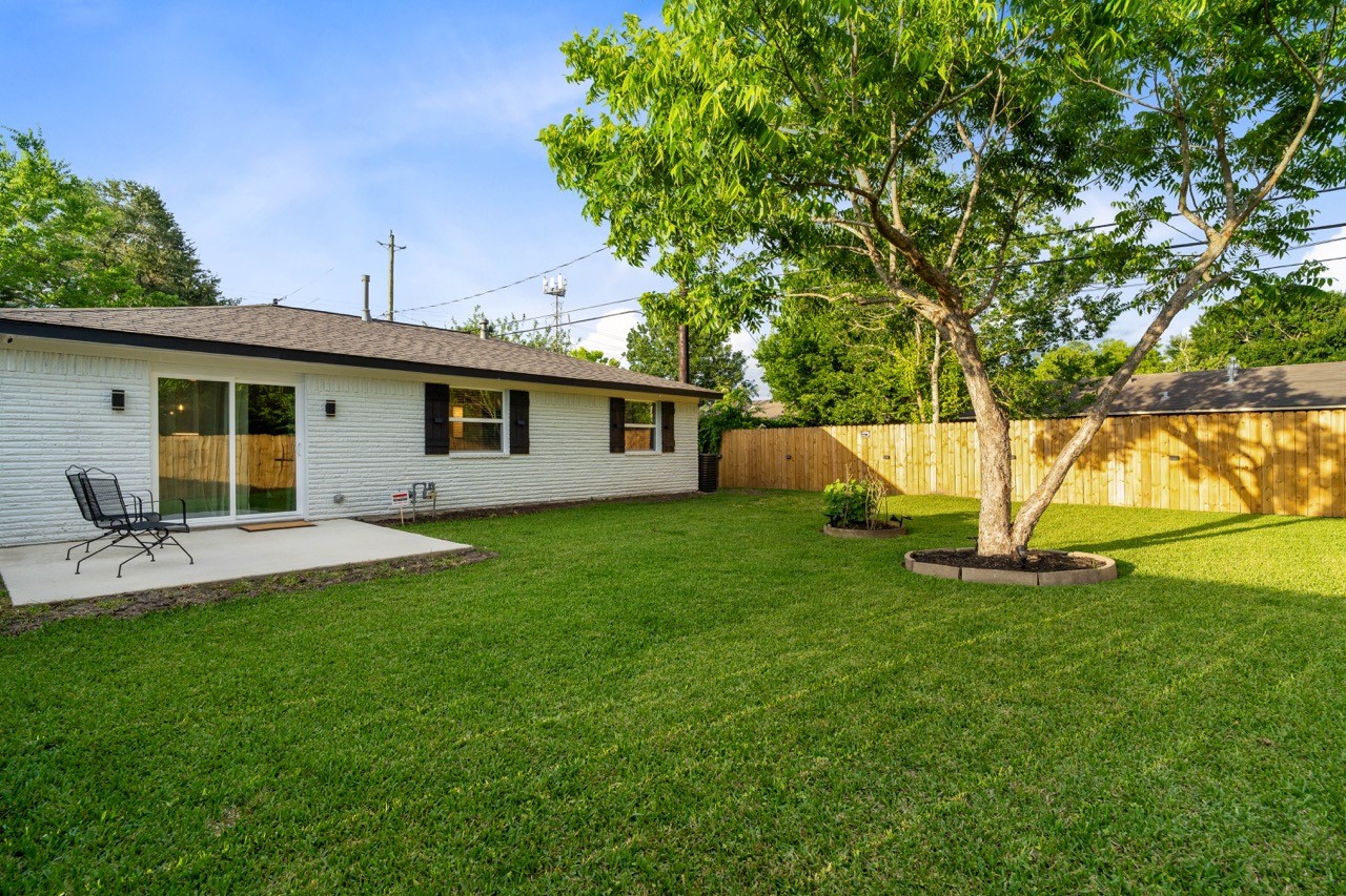 3138 Sunbeam Street Houston, TX 77051 - Photo 42 of 50 Enjoy seamless indoor-outdoor living with a spacious 12x12 patio, beautifully maintained lawn, and inviting backyard retreat.