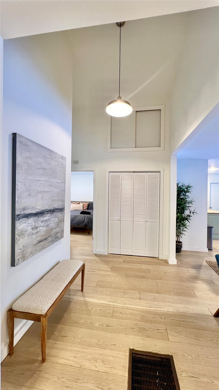 471 Horseshoe Lake Road Swan Lake, NY 12783 - Photo 13 of 39 a living room with furniture and a chandelier