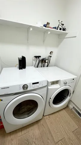 a utility room with dryer and washer