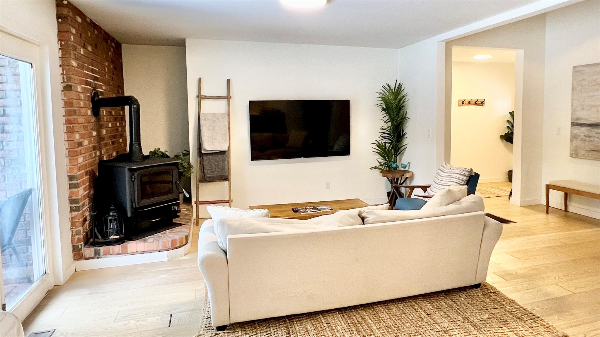 471 Horseshoe Lake Road Swan Lake, NY 12783 - Photo 18 of 39 a living room with furniture and a flat screen tv