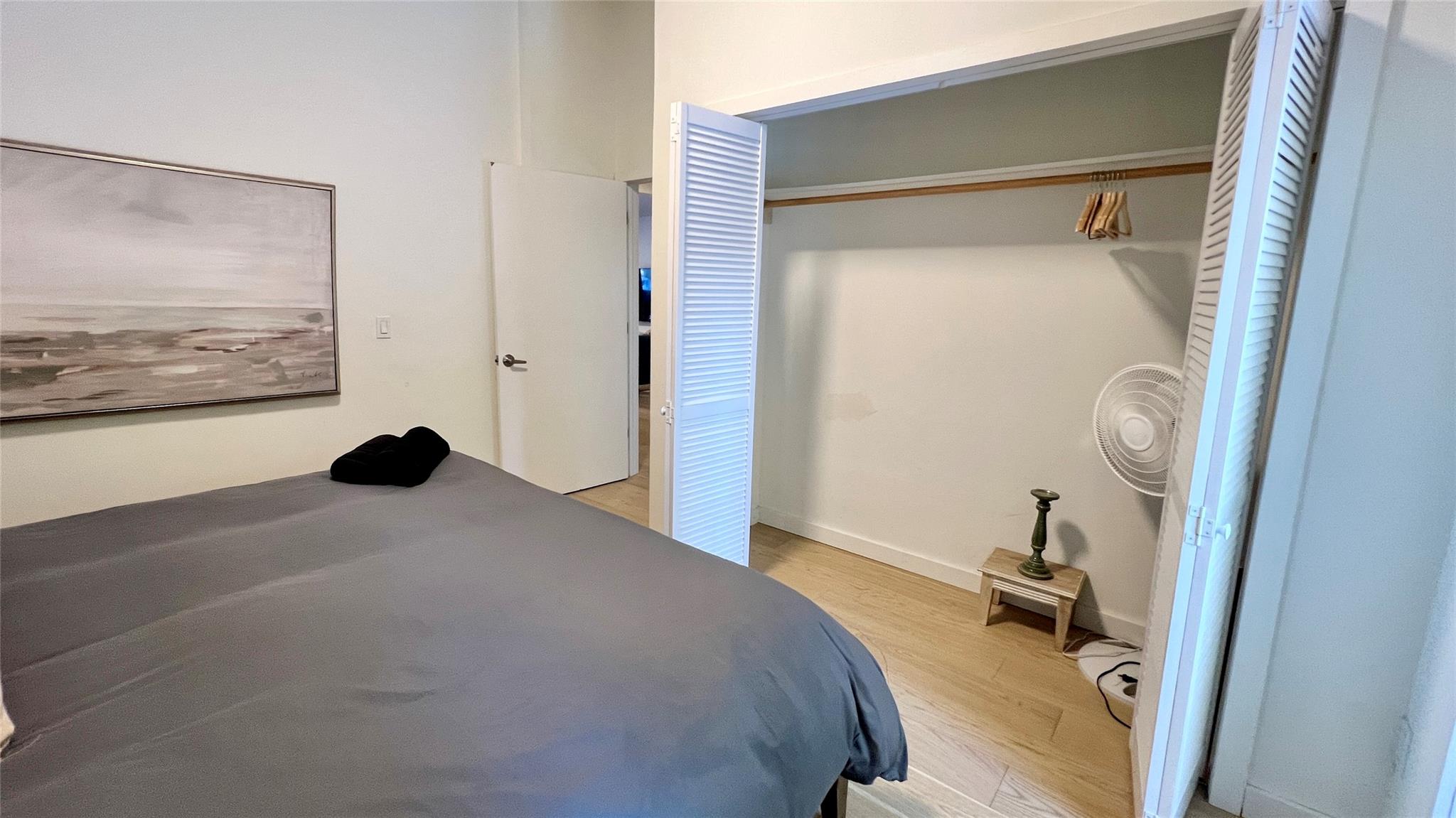 471 Horseshoe Lake Road Swan Lake, NY 12783 - Photo 23 of 39 a bedroom with a bed and a painting on the wall