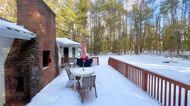 a view of a chairs and tables in the balcony