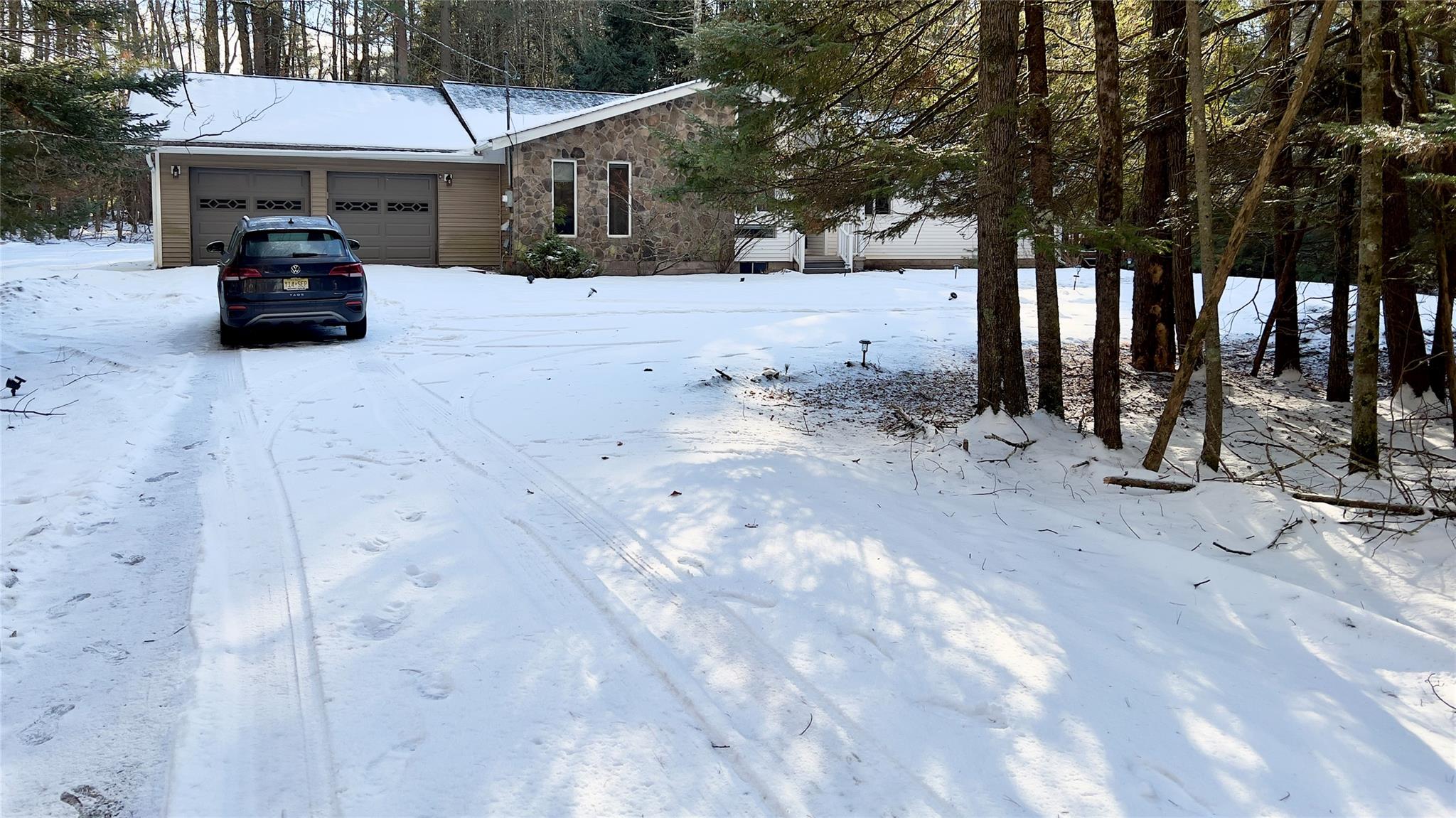 471 Horseshoe Lake Road Swan Lake, NY 12783 - Photo 26 of 39 a car parked in front of white house