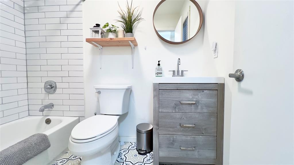 471 Horseshoe Lake Road Swan Lake, NY 12783 - Photo 36 of 39 a bathroom with a sink a toilet and a mirror