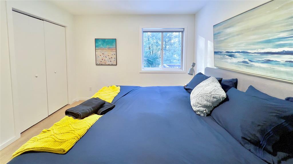 471 Horseshoe Lake Road Swan Lake, NY 12783 - Photo 37 of 39 a bed sitting in a bedroom next to a window