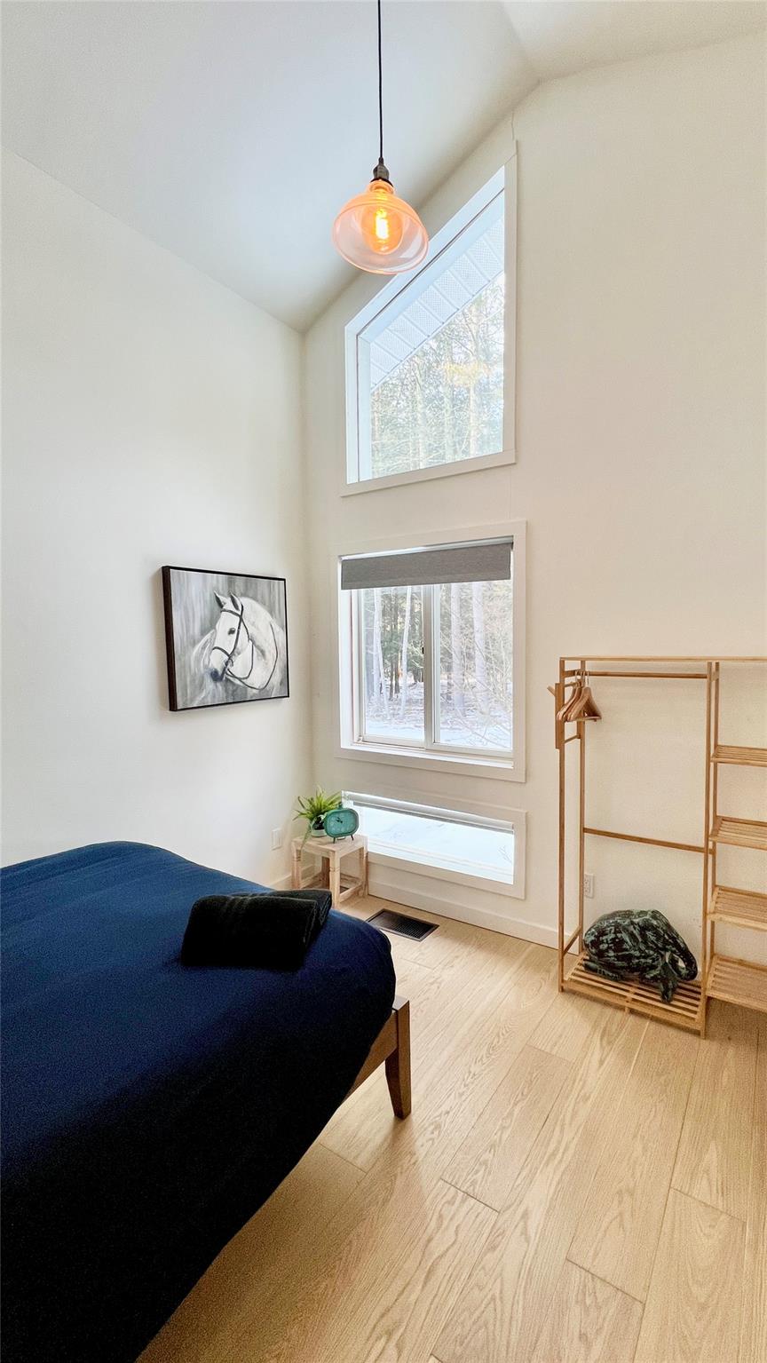 471 Horseshoe Lake Road Swan Lake, NY 12783 - Photo 10 of 39 a bedroom with a bed and window