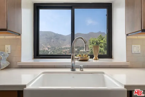 a view of a sink with a living room