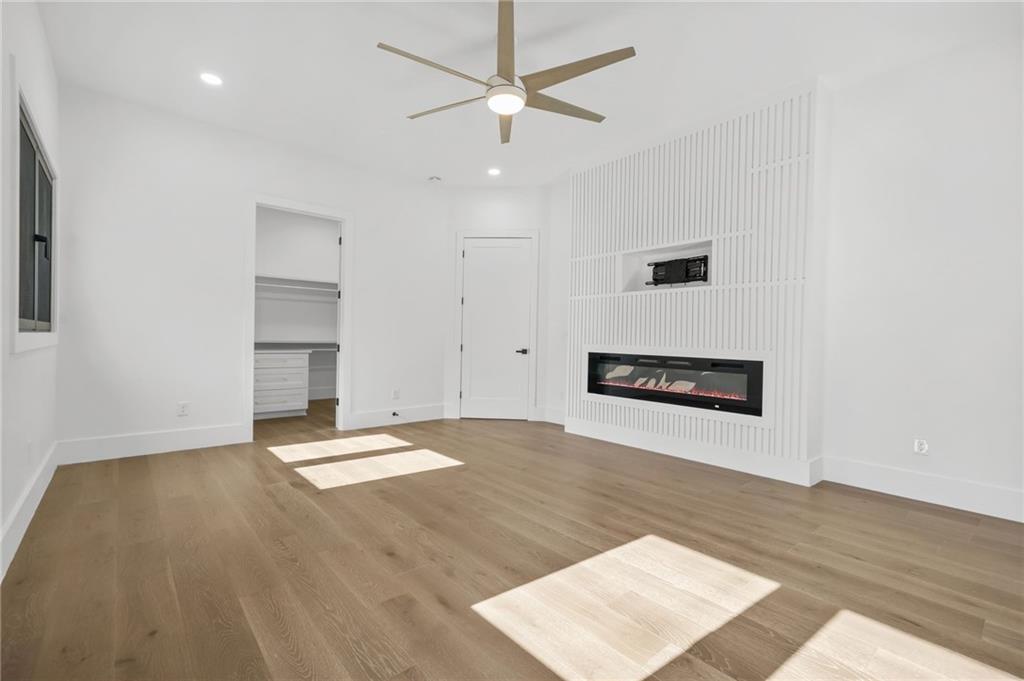 5175 Cascade Road Atlanta, GA 30331 - Photo 19 of 62 a view of an empty room with a window and a kitchen