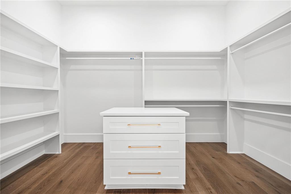 5175 Cascade Road Atlanta, GA 30331 - Photo 21 of 62 a view of walk in closet with empty racks