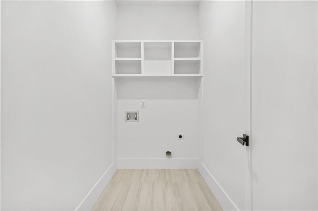 5175 Cascade Road Atlanta, GA 30331 - Photo 30 of 62 a view of a small space with wooden floor and a window