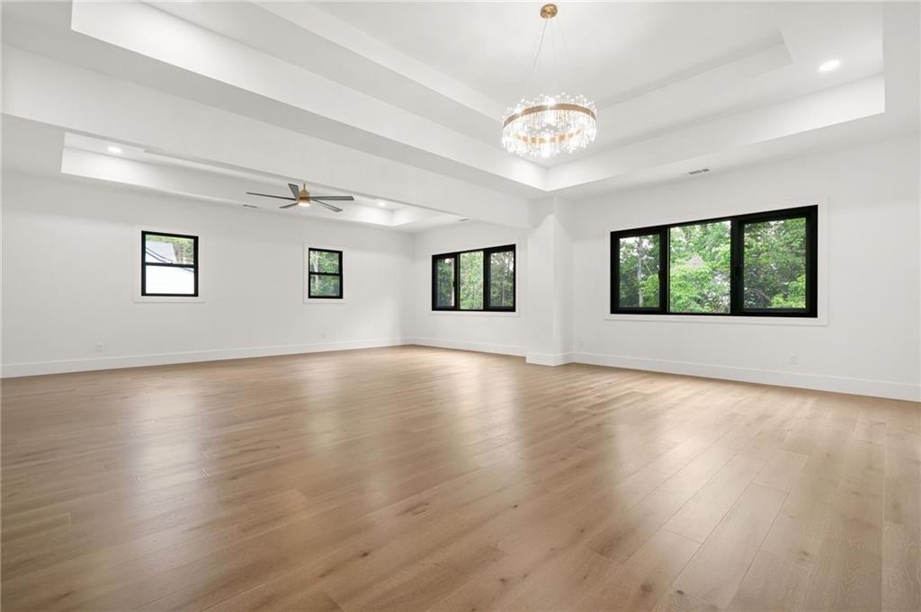 5175 Cascade Road Atlanta, GA 30331 - Photo 47 of 62 a view of an empty room with wooden floor and a window