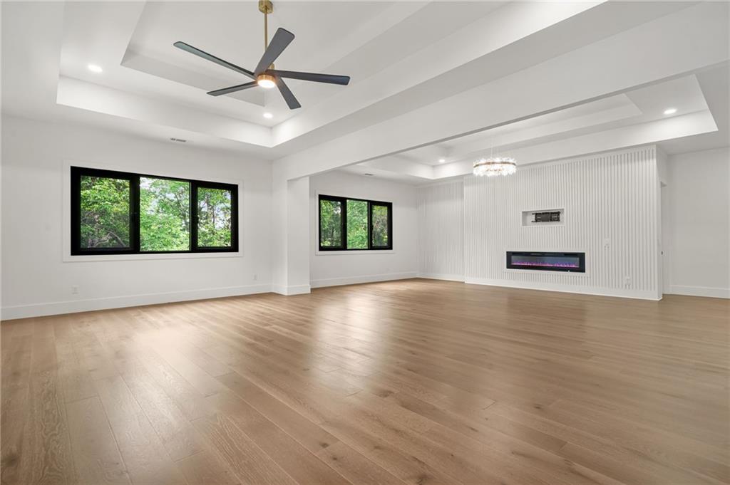5175 Cascade Road Atlanta, GA 30331 - Photo 49 of 62 a view of an empty room with a window and wooden floor