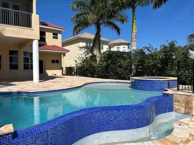 a view of outdoor space yard and swimming pool