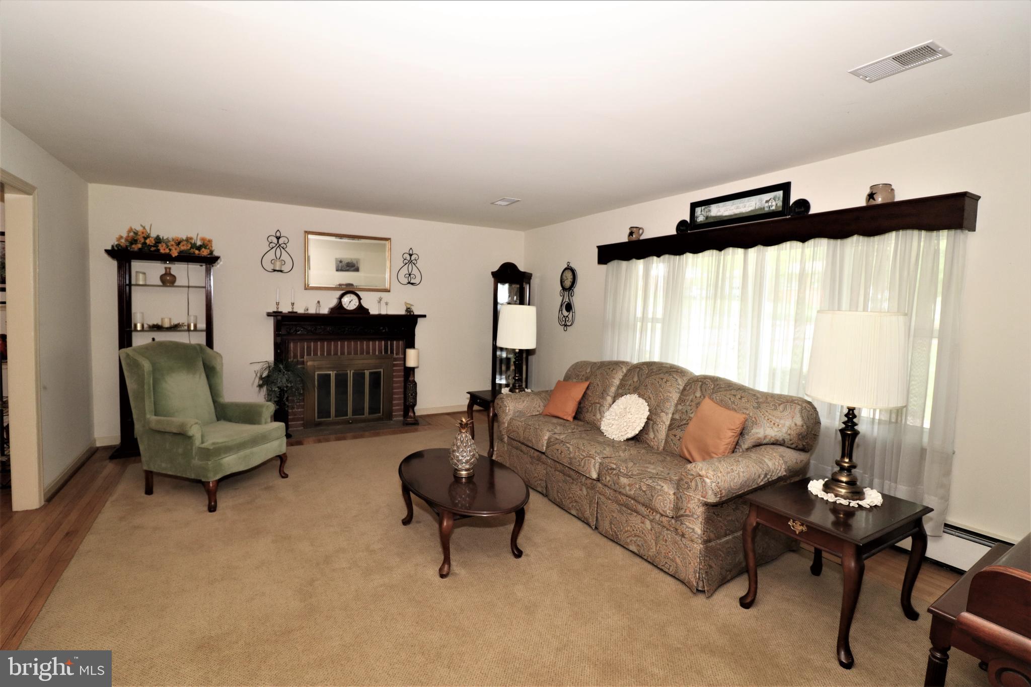 22 Blue Ridge Street Warrenton, VA 20186 - Photo 6 of 28 Living Room with fireplace