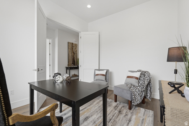 653 East Vandalay Lane Draper, UT 84020 - Photo 6 of 61 Bright interior space featuring a recessed ceiling light and wood-finish flooring