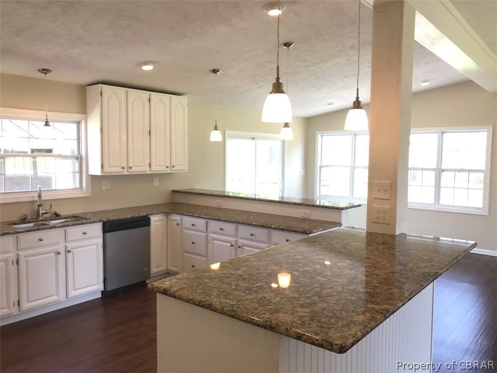 2181 Greys Point Road Topping, VA 23169 - Photo 14 of 20 Island in kitchen with additional seating space as a breakfast bar.