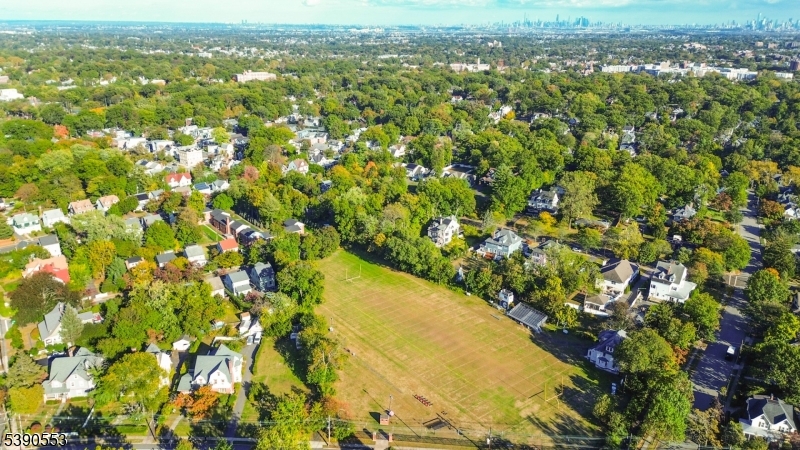 261 Orange Road Montclair, NJ 07042 - Photo 11 of 14 an aerial view of residential houses with outdoor space and trees
