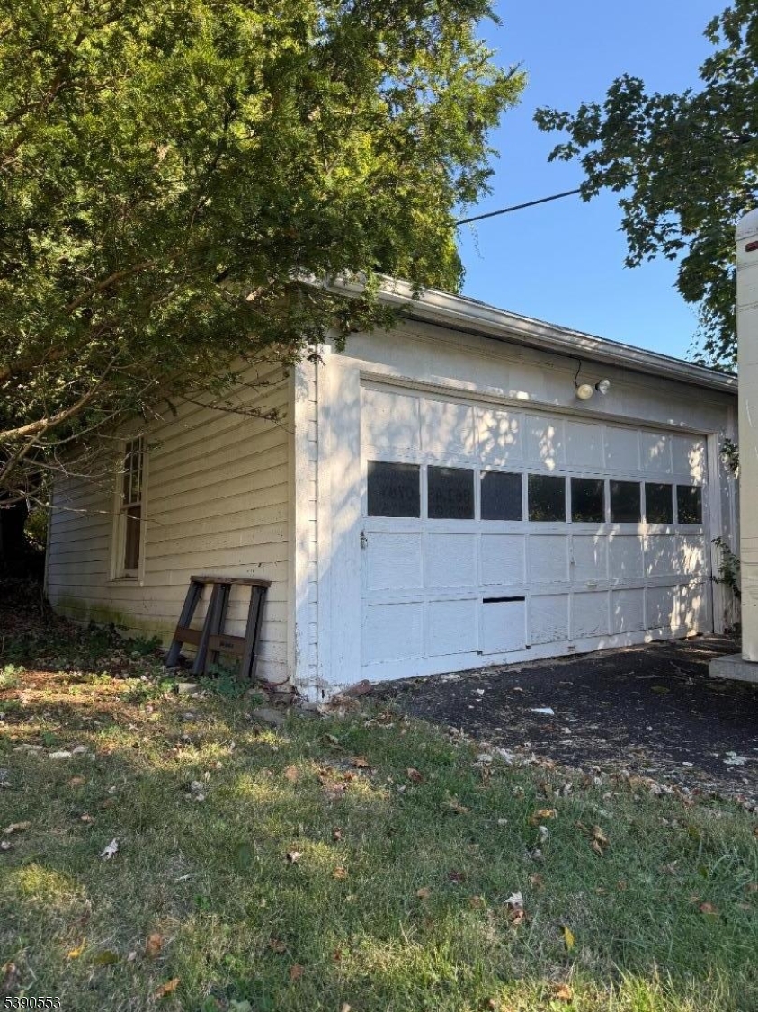 261 Orange Road Montclair, NJ 07042 - Photo 14 of 14 a front view of a house with a garden