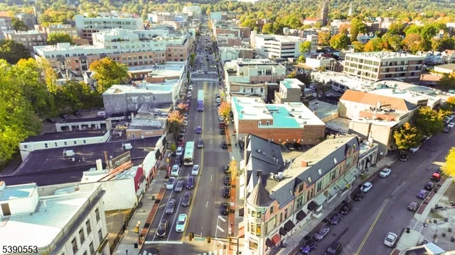 a street sign on a street next to a building