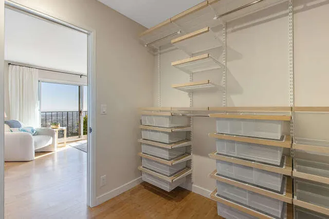 a reading room with furniture and a rug