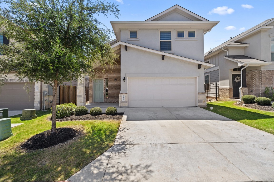 11906 Farrier Lane Austin, TX 78748 - Photo 1 of 1 a front view of a house with garden