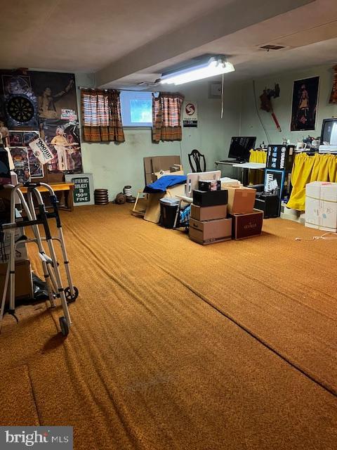 1424 Faunce Street Philadelphia, PA 19111 - Photo 17 of 19 a room with gym equipment and a flat screen tv