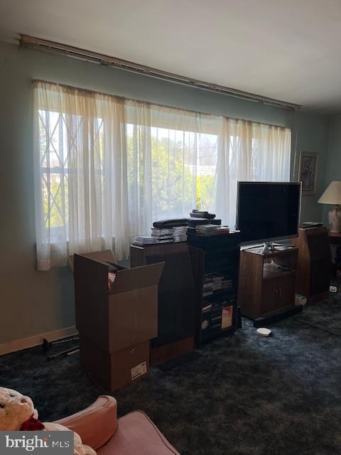 1424 Faunce Street Philadelphia, PA 19111 - Photo 18 of 19 a living room with furniture and a flat screen tv