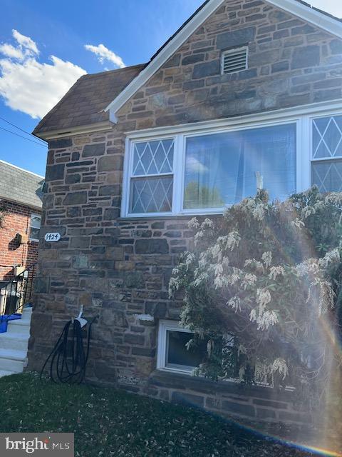 1424 Faunce Street Philadelphia, PA 19111 - Photo 2 of 19 a brick building with a bench in front of it