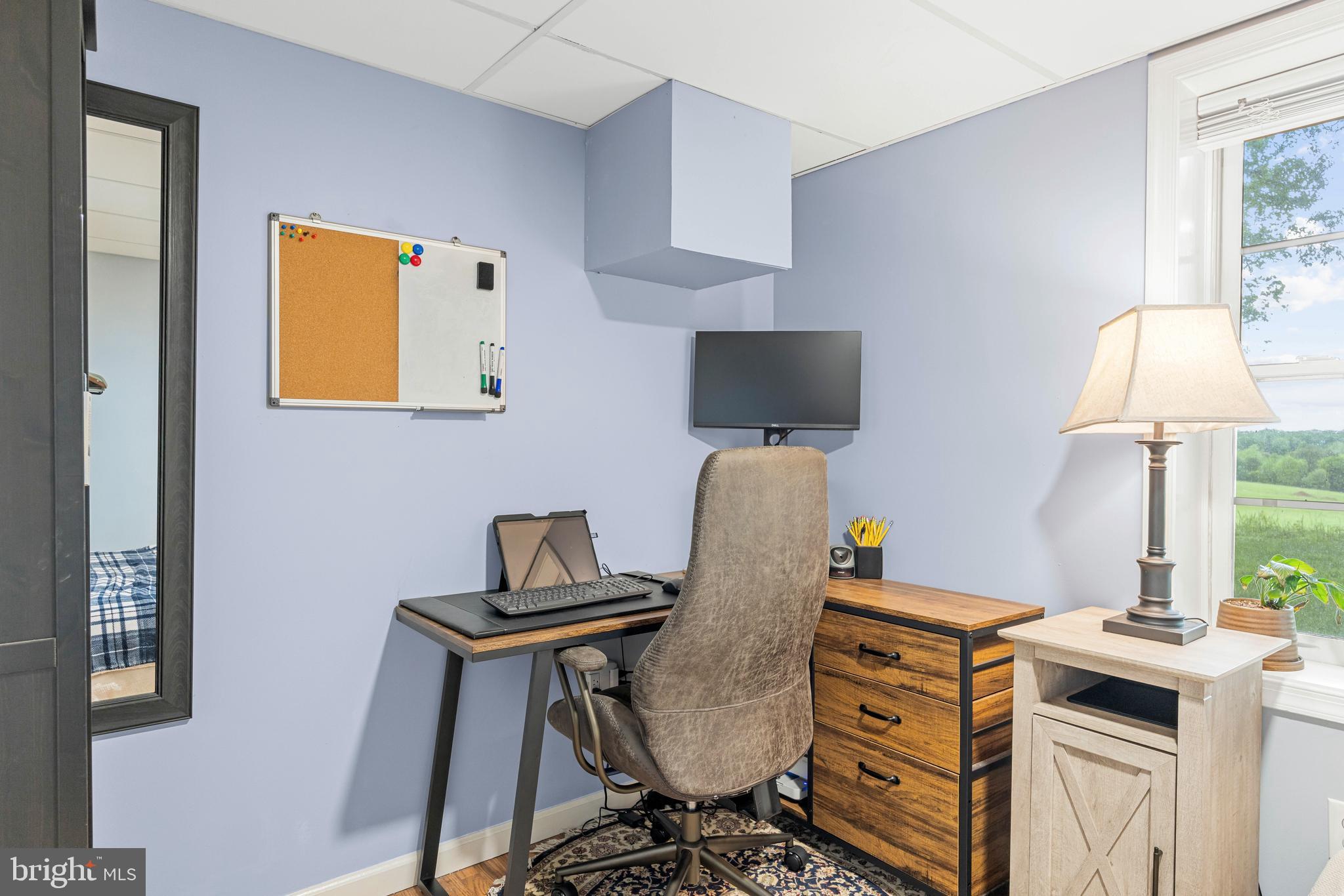1425 Jacks Shop Road Rochelle, VA 22738 - Photo 33 of 56 a view of workspace with wooden floor windows