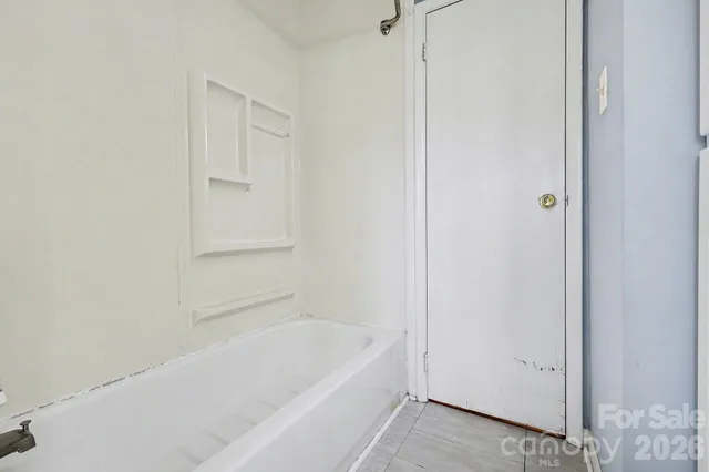 a bathroom with a bathtub