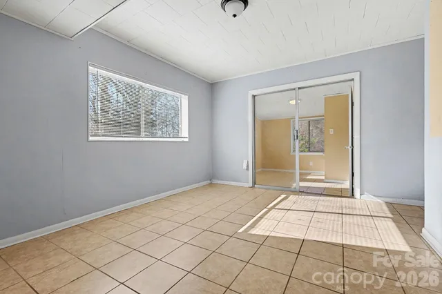 a view of an empty room and window